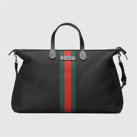 borsa viaggio uomo gucci|Scopri la nuova collezione di borse Gucci uomo su FARFETCH.